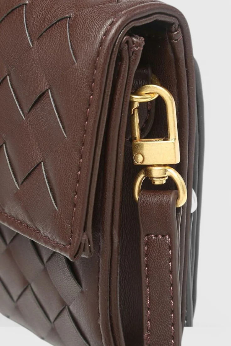Gara | Bolso de mano con detalle de cinta dorada