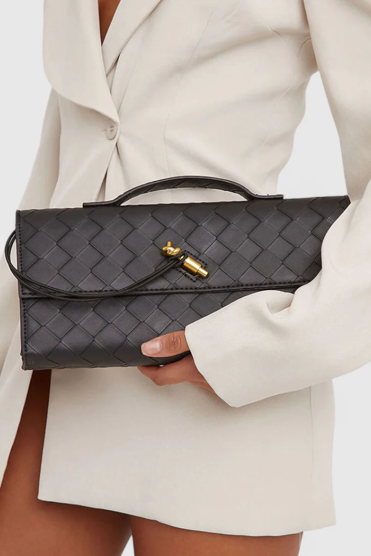 Gara | Bolso de mano con detalle de cinta dorada